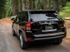 2014-jeep-compass-limited-rear-three-quarters-in-motion