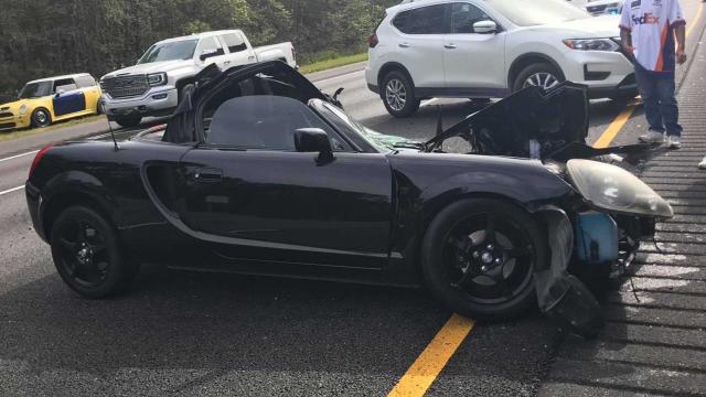 toyota-mr2-crashes-into-semi-truck